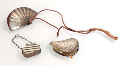 Lot A silver pin cushion modelled as a mussel,...