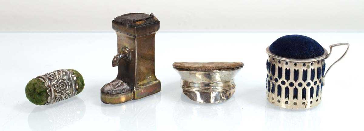 Lot A silver pin cushion modelled as a water...