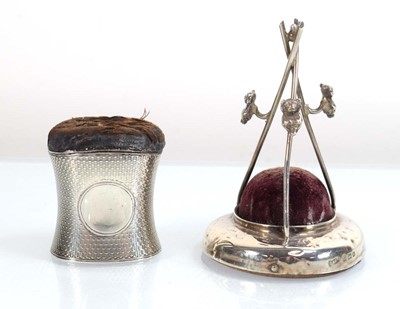 Lot A silver pin/hat pin cushion of tripod form,...