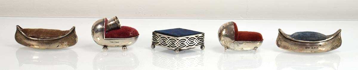 Lot A silver pin cushion modelled as a crib, Adie...