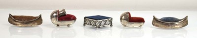 Lot A silver pin cushion modelled as a crib, Adie...