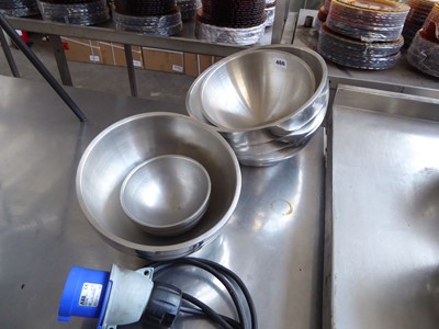 Lot 466 - 4 graduated sized Vollrath stainless steel...