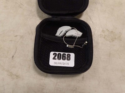 Lot 2068 - A pair of Amplifon mini hearing aids in a case