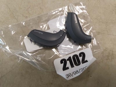 Lot 2102 - A pair of Resound UP977 Digital hearing aids
