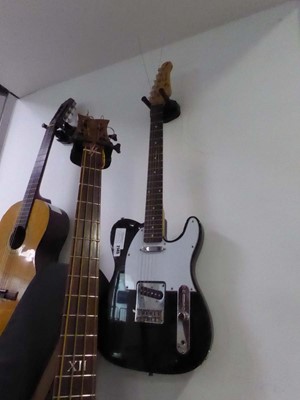 Lot 2145 - A 6-string J.Turser black and white electric...