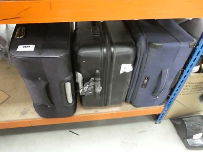 Lot 3024 - Three large suitcases