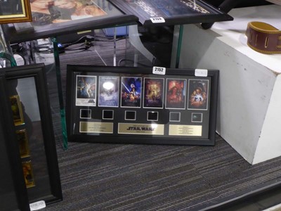 Lot 2152 - A framed collection of films cells from the...