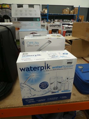 Lot 3052 - Waterpik water flosser and an Ottlite desk lamp