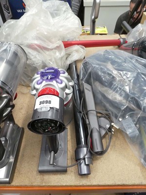 Lot 3098 - Handheld Dyson V8 with pole head, attachments...
