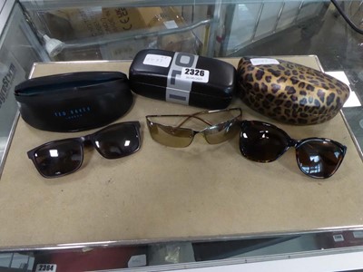 Lot 2326 - 3 pairs of sunglasses in cases from Ted Baker,...