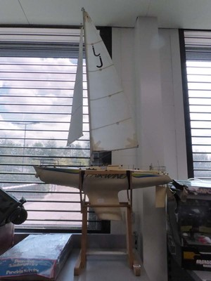 Lot 2396 - Model Kyosho racing yacht on a stand