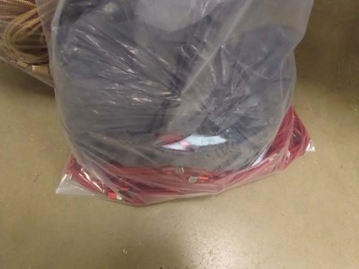 Lot 2481 - A bag containing USB to Micro cabling, in red