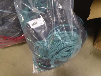 Lot 2482 - A bag containing USB to Micro cabling, in green