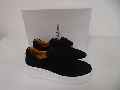 Lot 1975 - Russel & Bromley park bow flatform trainers in...