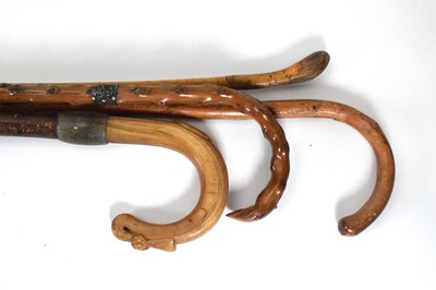 Lot 128 - A malacca walking stick with a silver mount...