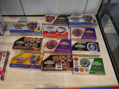 Lot 1608 - 11 various Takara Tomy Beyblade packs incl....