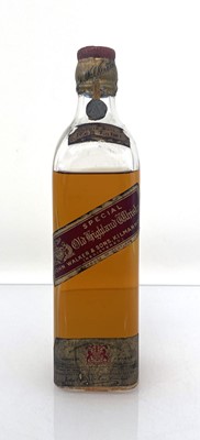 Lot 10 - An old bottle of Johnnie Walker Red Label...