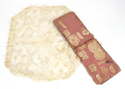 Lot 153 - An album containing a small group of lace...