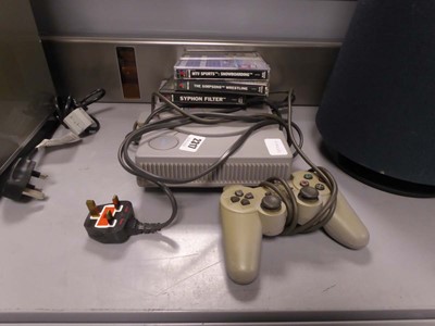 Lot 2317 - Sony PlayStation along with 3 games, Syphon...
