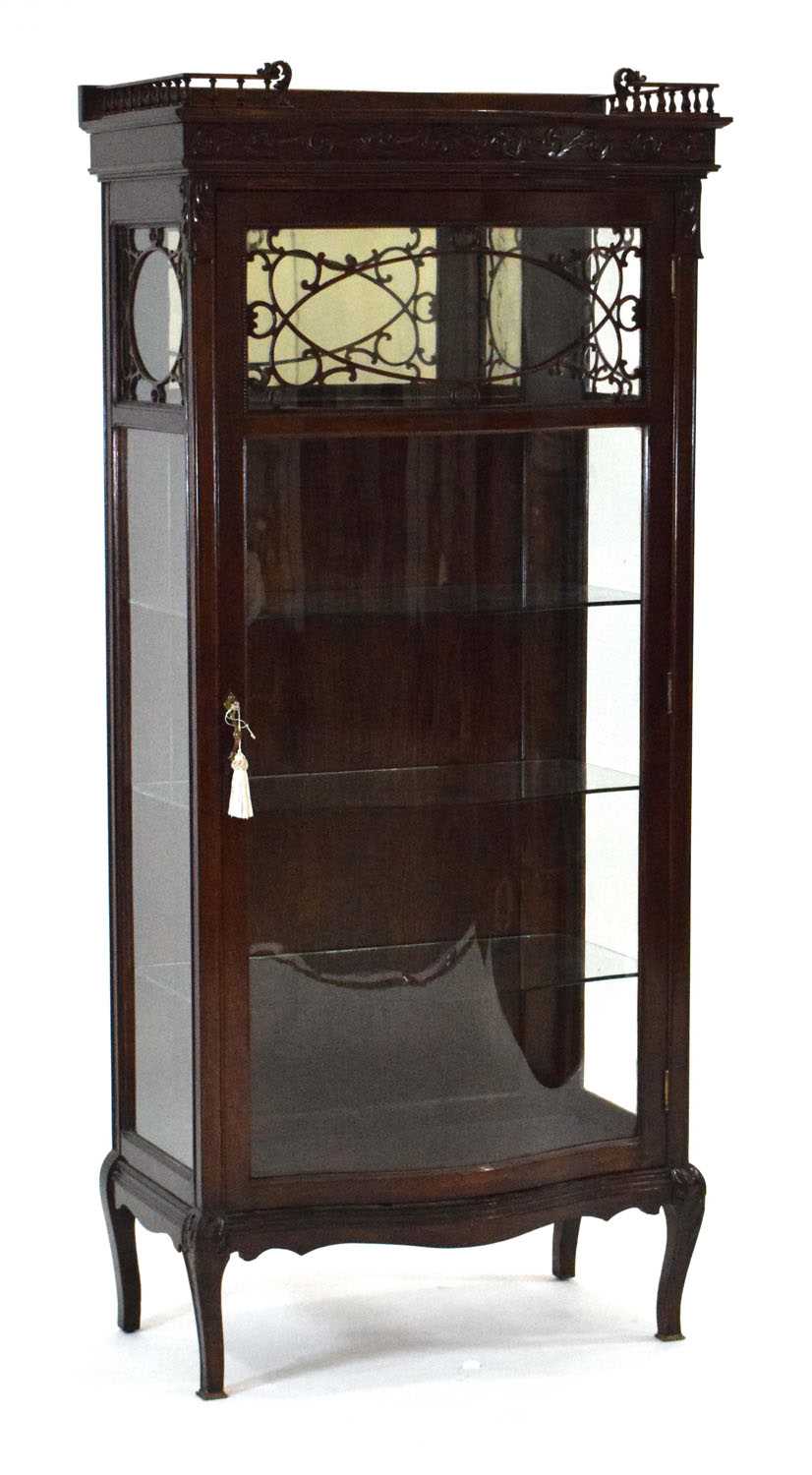 Lot 11 - A 20th century stained-oak display cabinet,...