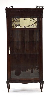 Lot 11 - A 20th century stained-oak display cabinet,...