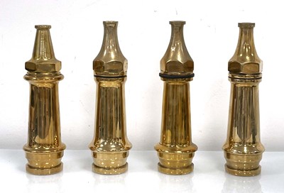 Lot 147 - A group of four 1940's brass fire nozzles...