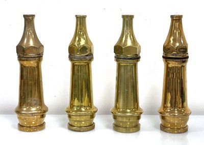 Lot 148 - A group of four 1940's brass fire nozzles...
