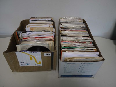 Lot 2 boxes of 7" singles incl. Bomb the Base,...
