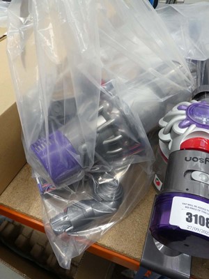 Lot 3109 - Hand held Dyson V10 with attachments and...