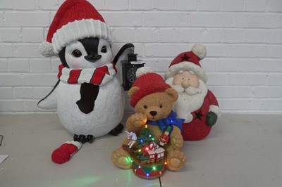Lot Ceramic Santa Claus with battery operated...