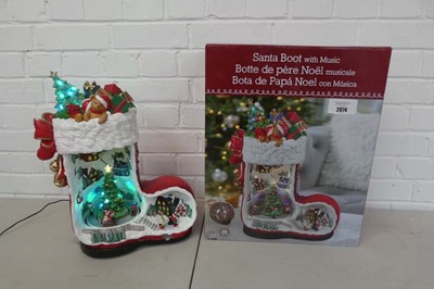 Lot Boxed Christmas themed animated Santa boot...