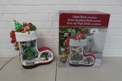Lot Boxed Christmas themed animated Santa boot...