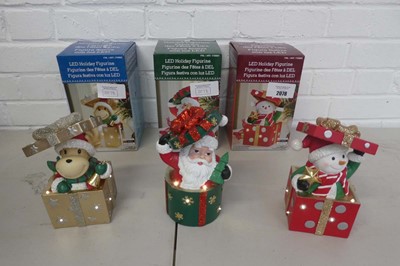 Lot Set of 3 boxed light up LED holiday figurines...