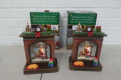 Lot Pair of boxed Christmas themed Santa on sleigh...