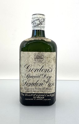 Lot 117 - A old half size bottle of Gordon's Special Dry...