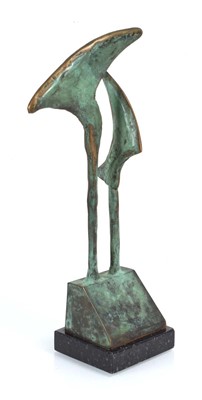 Lot 69 - A brown-patinated bronze sculpture on a marble...