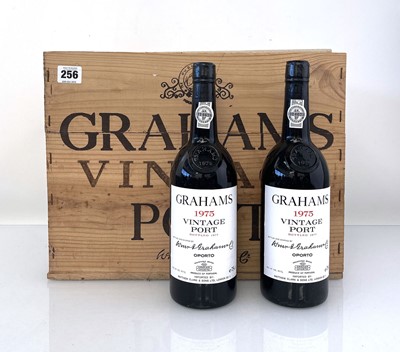 Lot 256 - A part wooden case of 9 bottles of 1975 W & J...