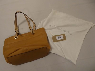 Lot 3581 - Michael Kors handbag in light brown with dust...