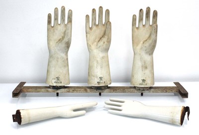 Lot 90 - A set of three Rosenthal glove moulds or shop...