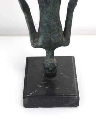 Lot 160 - A green-patinated bronze sculpture modelled as...
