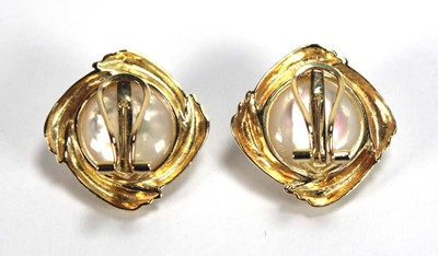 Lot 504 - A pair of 14ct yellow ear clips, each set a...
