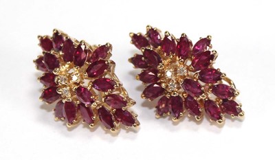 Lot 505 - A pair of 14ct yellow ear clips, each set...