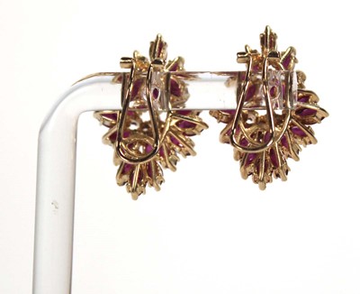 Lot 505 - A pair of 14ct yellow ear clips, each set...