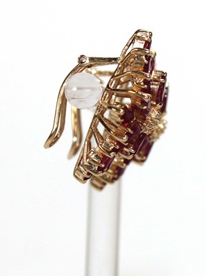 Lot 505 - A pair of 14ct yellow ear clips, each set...