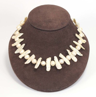 Lot 507 - A single strand freshwater pearl necklet with...