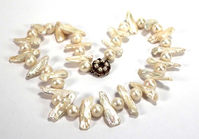 Lot 507 - A single strand freshwater pearl necklet with...