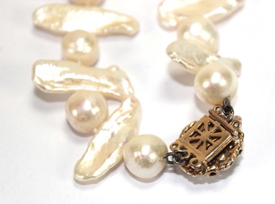 Lot 507 - A single strand freshwater pearl necklet with...