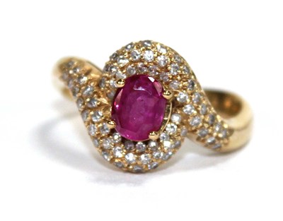 Lot 510 - An 18ct yellow gold crossover ring set oval...