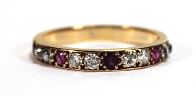 Lot 513 - A yellow metal half eternity ring set five...