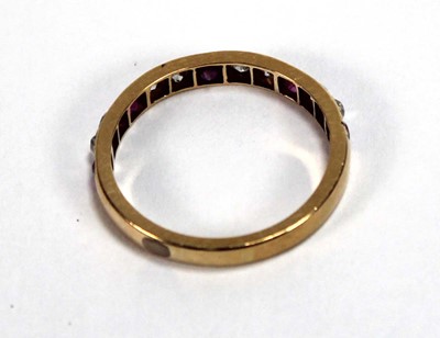 Lot 513 - A yellow metal half eternity ring set five...